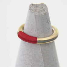 Load image into Gallery viewer,  A contemporary and chic HADAS SHAHAM Red Thread Stacking Ring made from gold plated brass, concrete, and red nylon thread.
